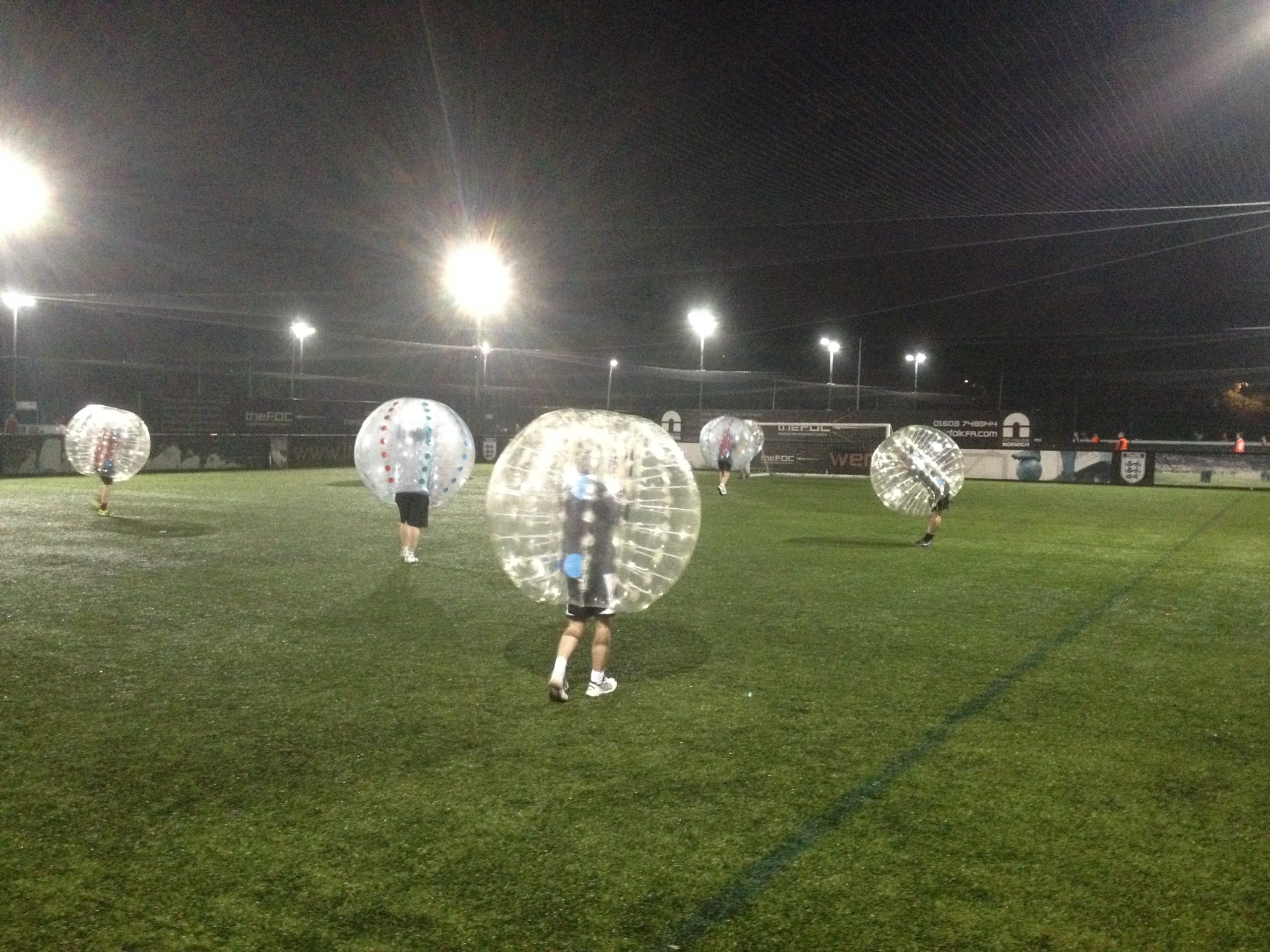 People Playing Bubble Football