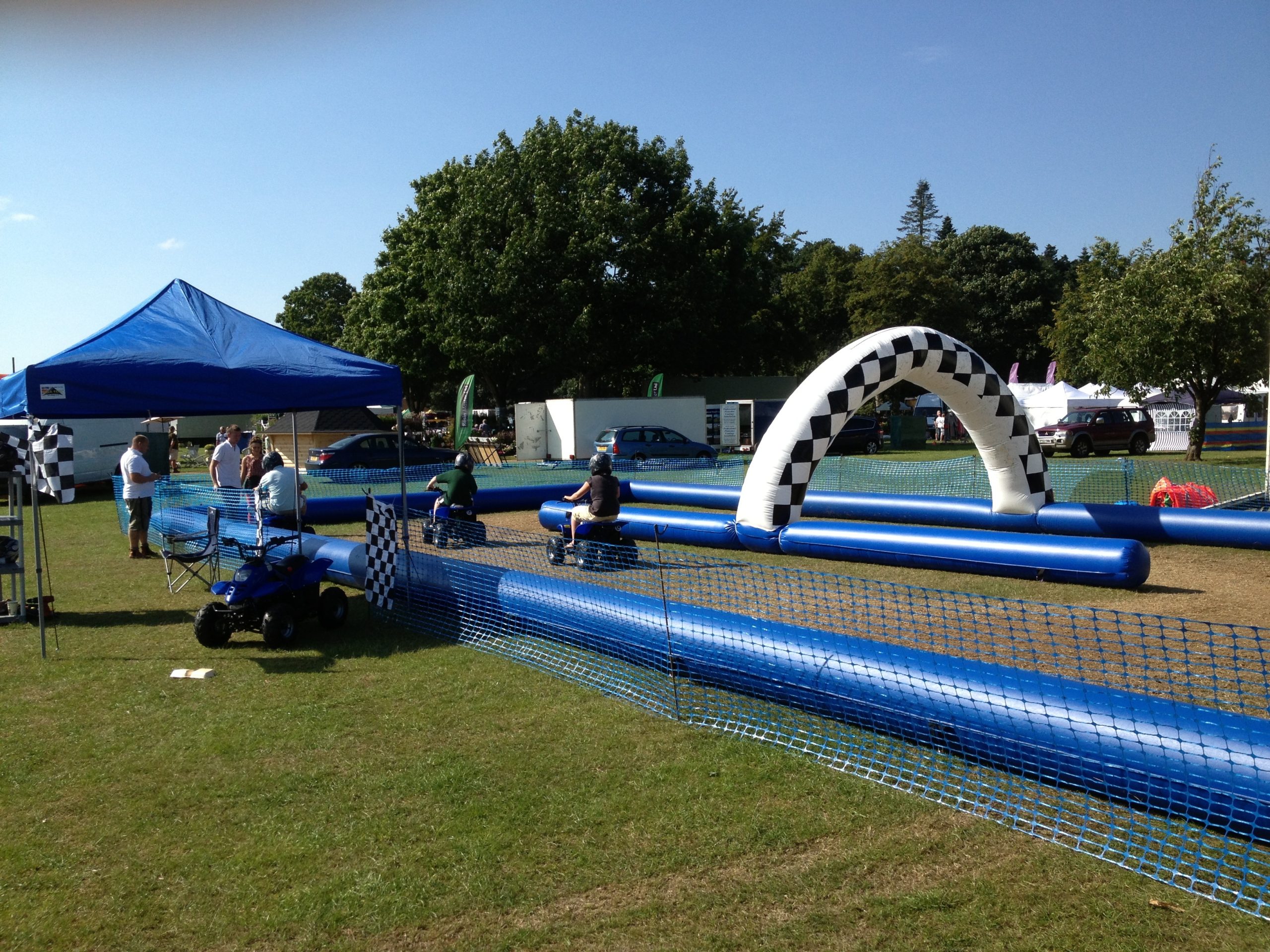 People On Inflatable Quad Biking Course