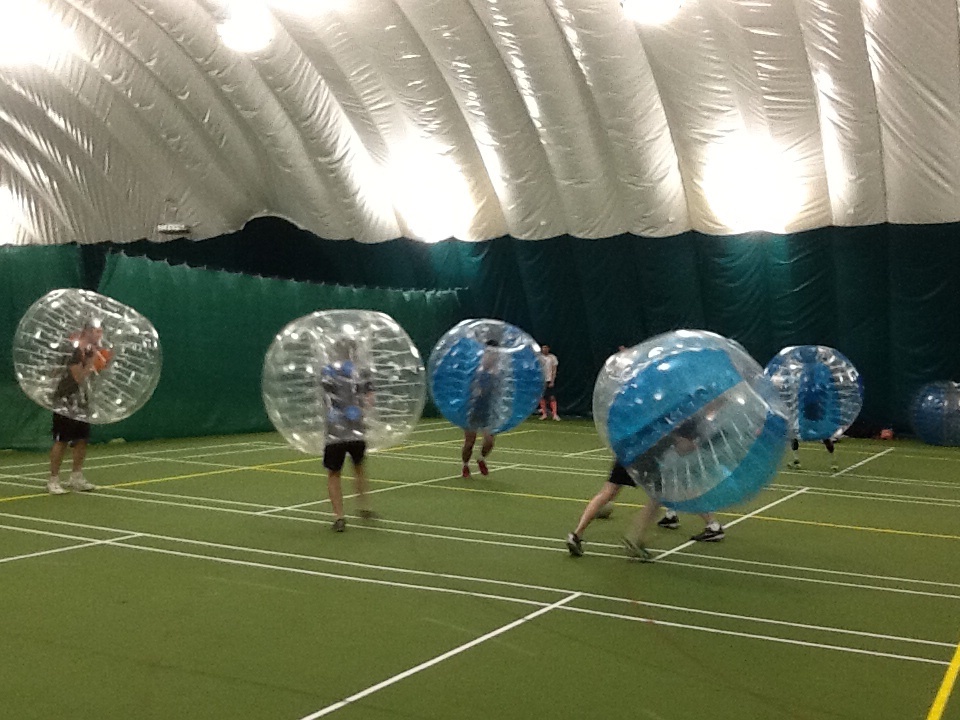 People Playing Bubble Football
